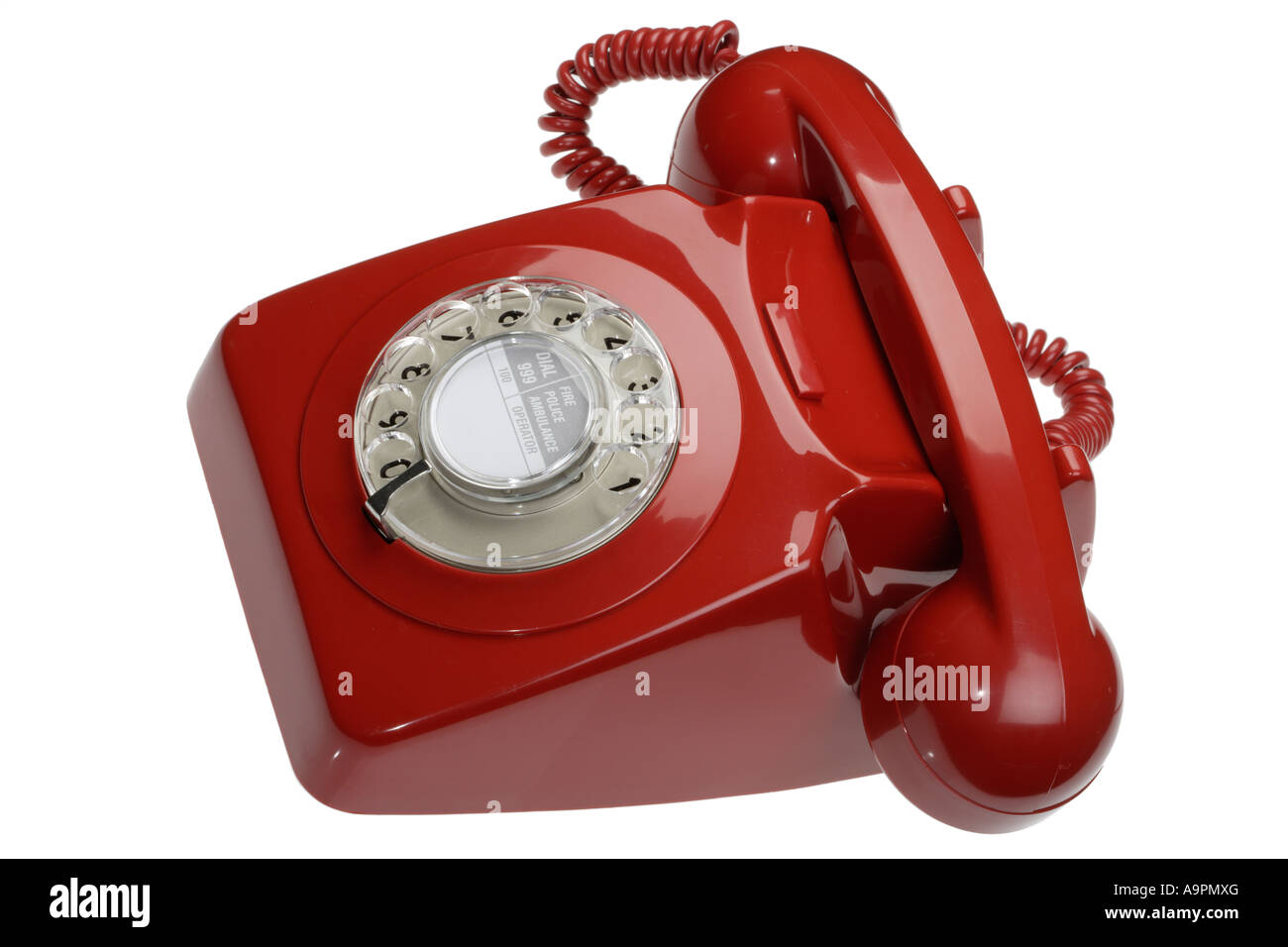 Red old fashioned disc dialling phone Stock Photo