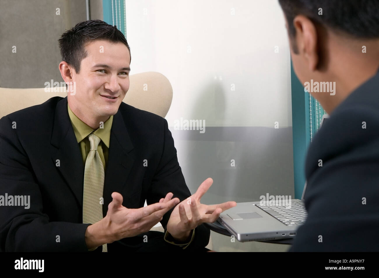 Businessmen having a discussion Stock Photo