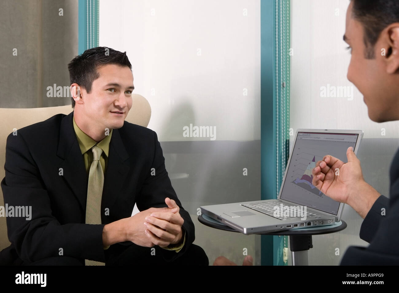 Businessmen having a discussion Stock Photo