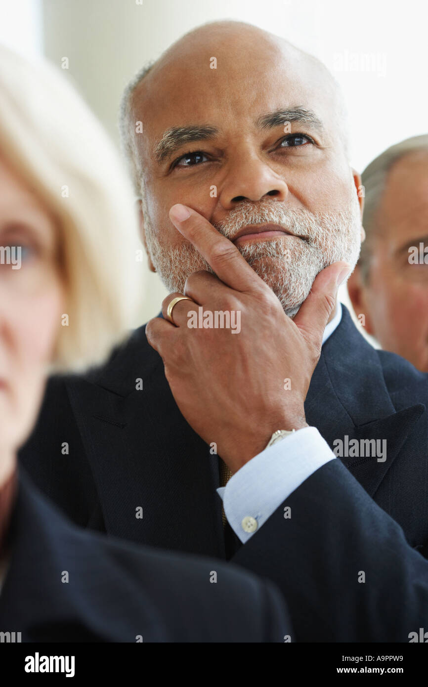 Portrait of a business man looking thoughtful Stock Photo