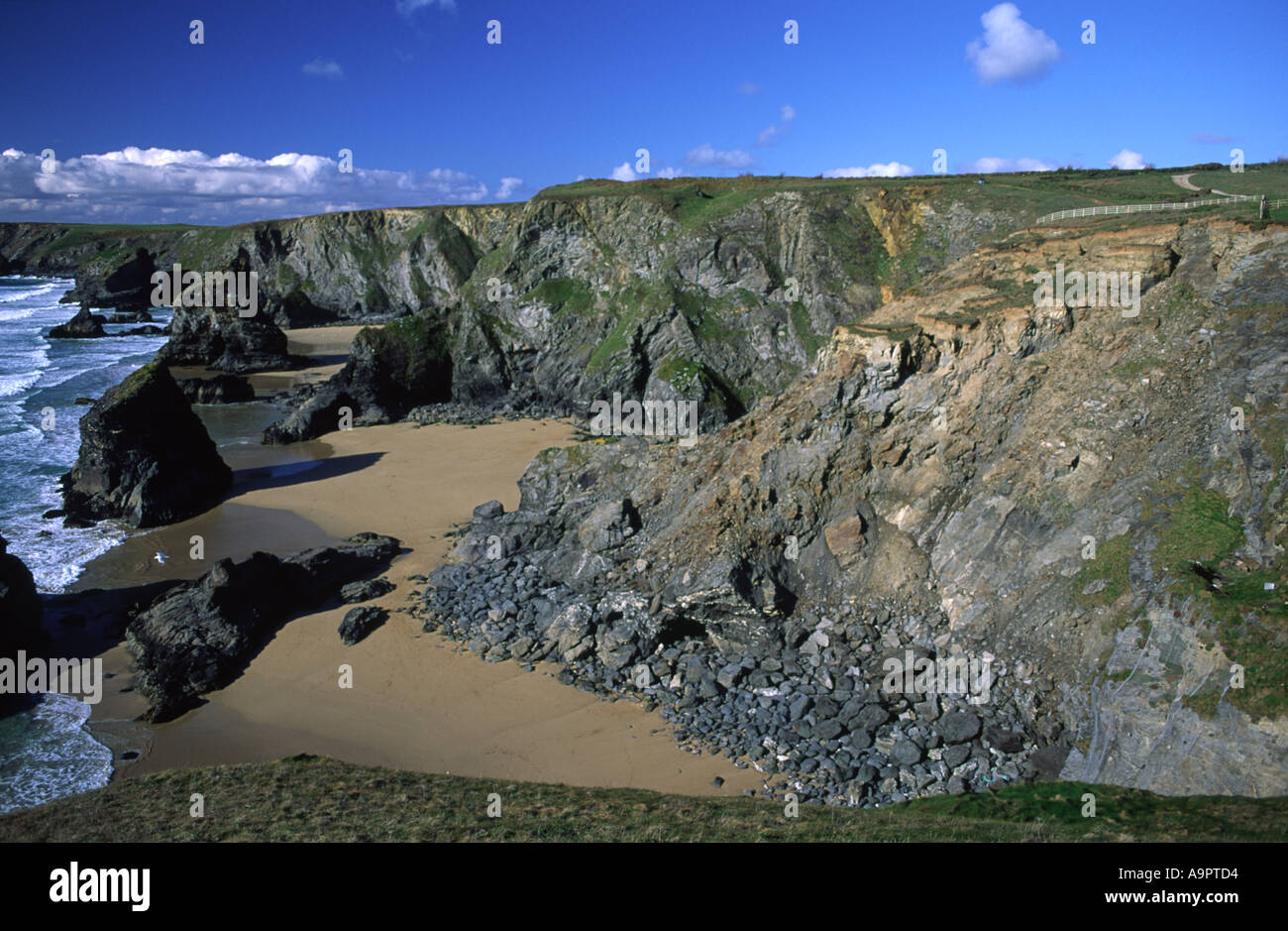 Coastal cliff erosion at Bedruthan Steps in Cornwall county England UK Stock Photo