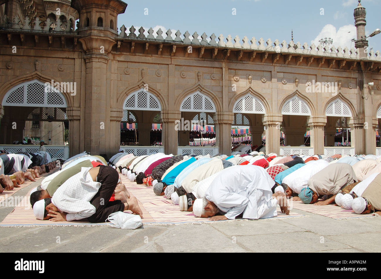 Muslim men praying at the Mecca Masjid Hyderabad Stock Photo Alamy