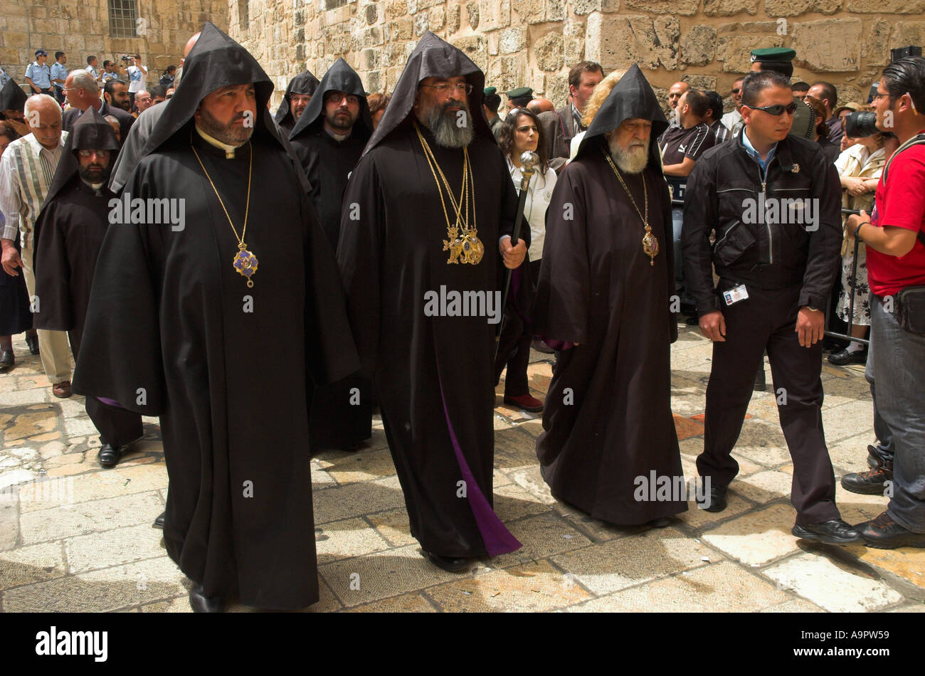 Israel Jerusalem old city holy sepulchre 3 coptic priests walking 
