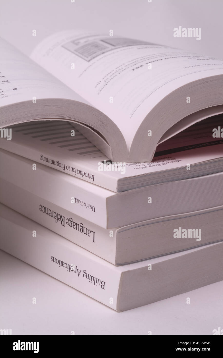 Stack of computer manuals Stock Photo Alamy