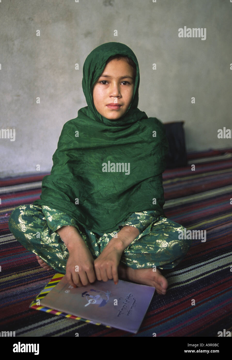A young Hazara girl now living in the city of Quetta Balochistan province Pakistan The Hazara are Shia muslims from Afghanistan Stock Photo
