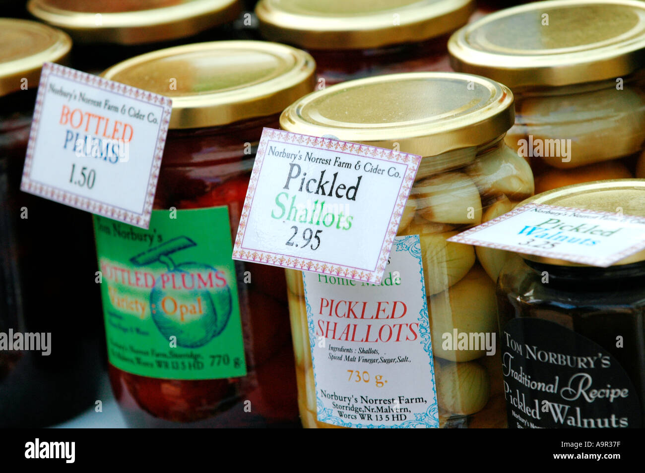 Jars of pickles and preserves for sale at Farmers Market in UK Stock Photo Alamy