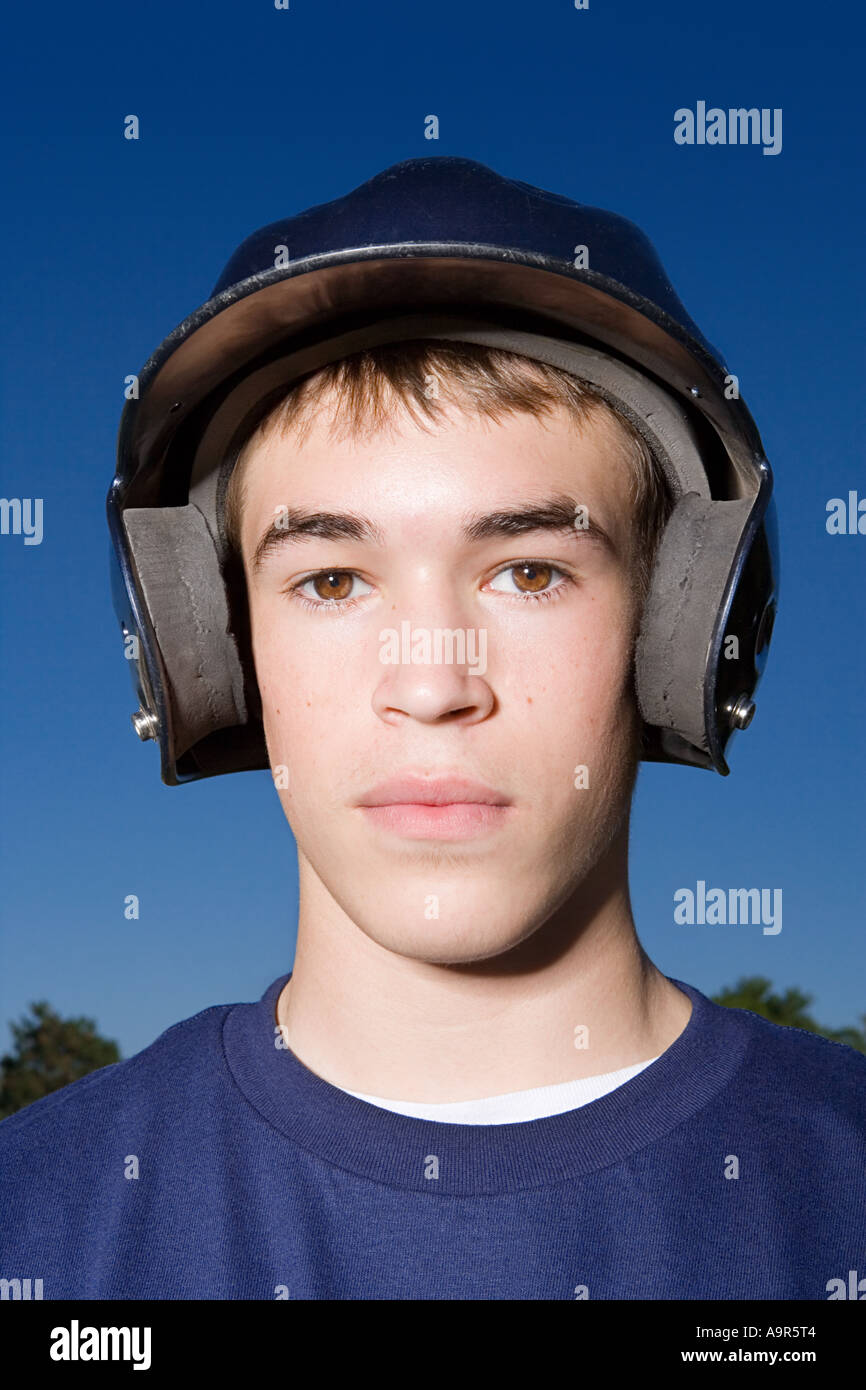 Portrait of a teenage boy wearing a helmet Stock Photo