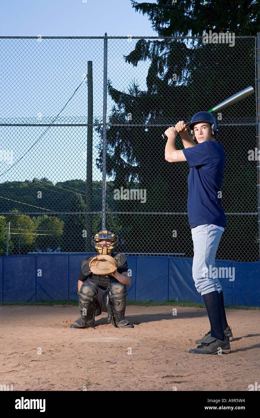 Teenage boy ready to hit baseball Stock Photo