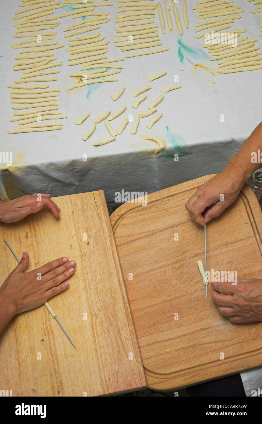 Italian mother and daughter making fresh pasta at home Stock Photo - Alamy