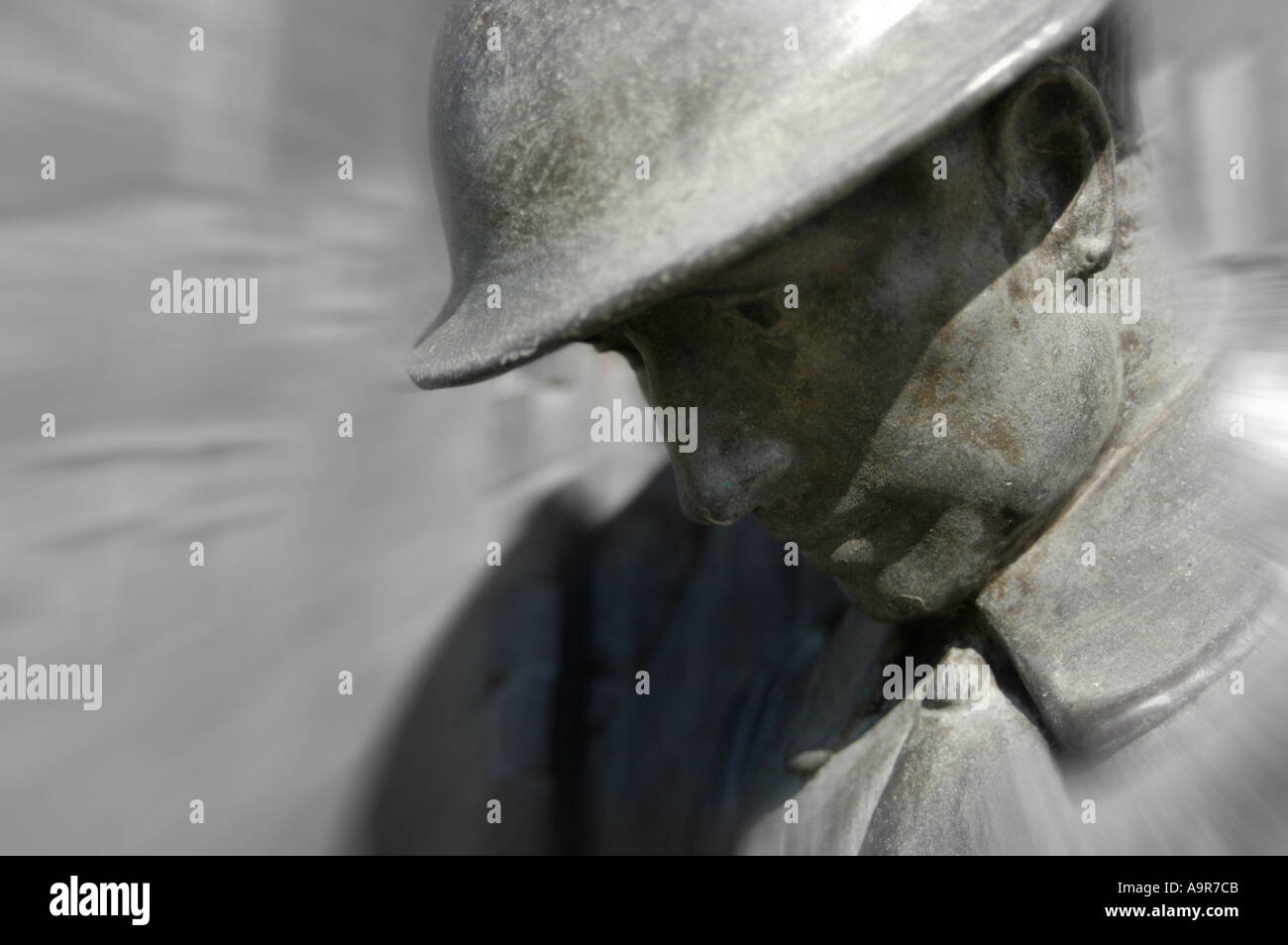 Statue of soldier in silent tribute at the national memorial arboretum