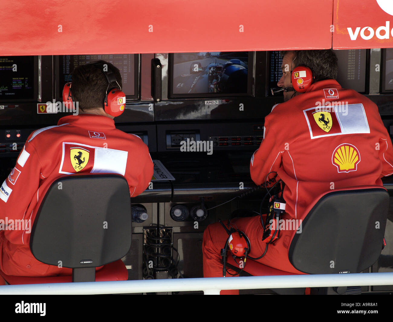 Ferrari Team Members at Work Stock Photo Alamy