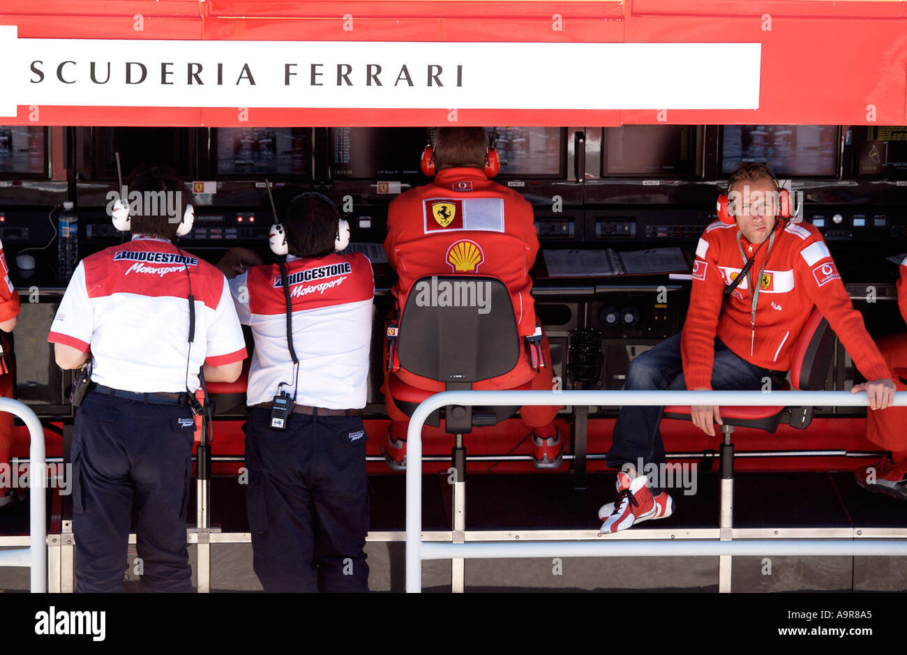 Ferrari Team Members at Work Stock Photo Alamy