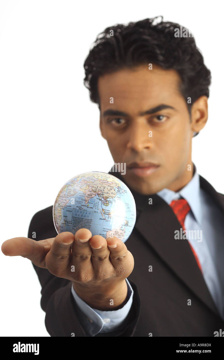 A Businessman holding a globe Stock Photo - Alamy