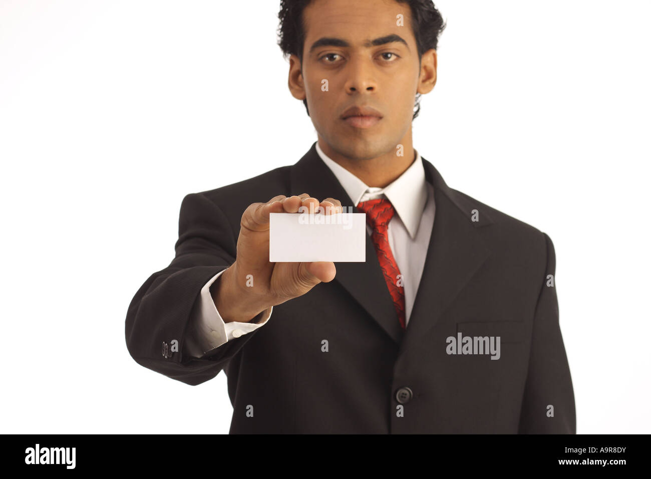 A Businessman holding a label Stock Photo - Alamy