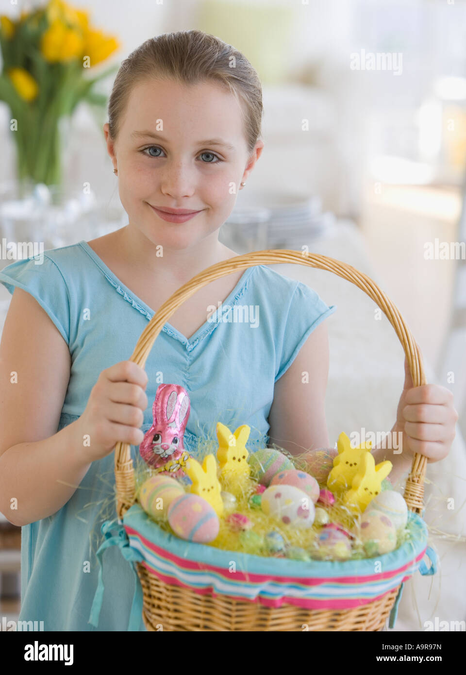 Girl holding Easter basket Stock Photo - Alamy