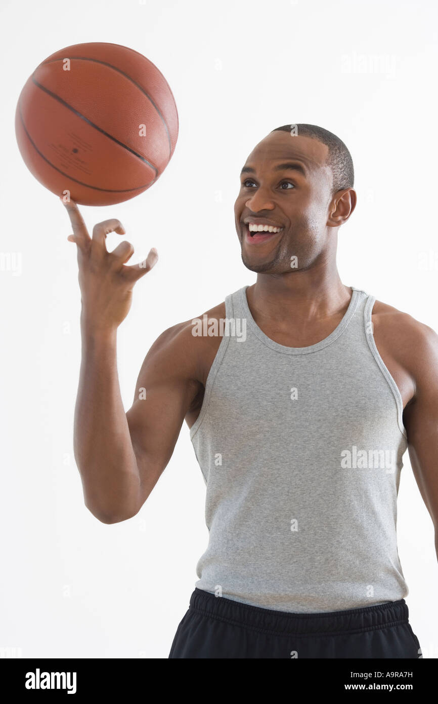 Spinning basketball on finger hi-res stock photography and images - Alamy