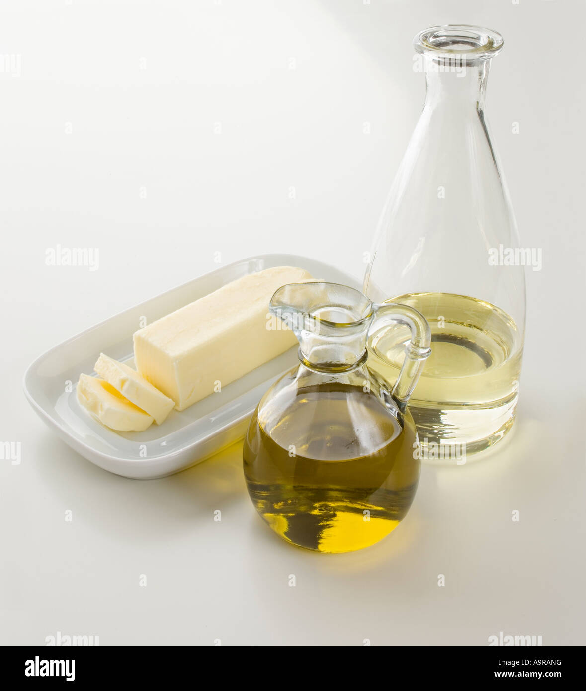 Butter oil and water on table Stock Photo - Alamy