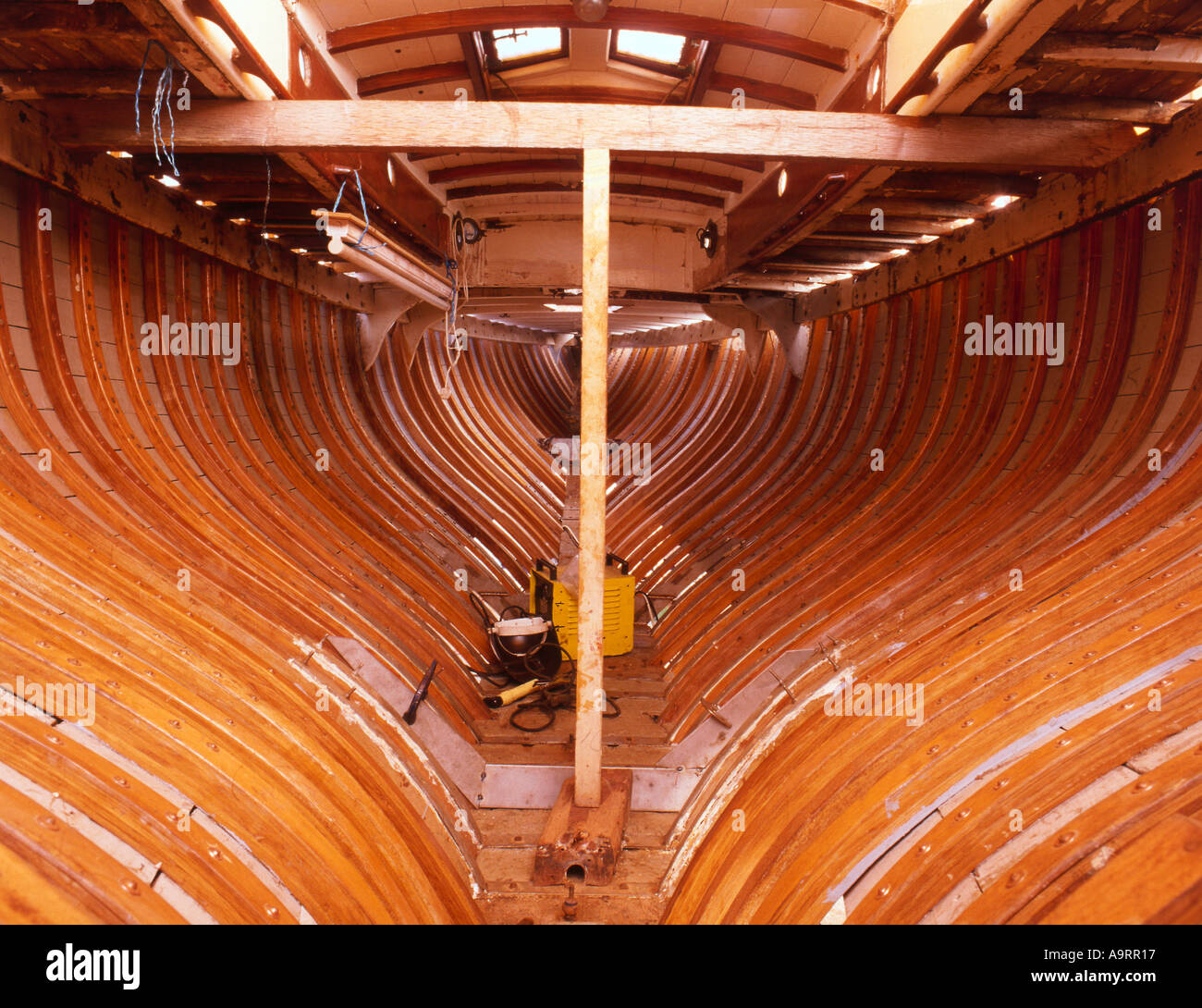 Restoring interior of wooden boat Elvira Stock Photo