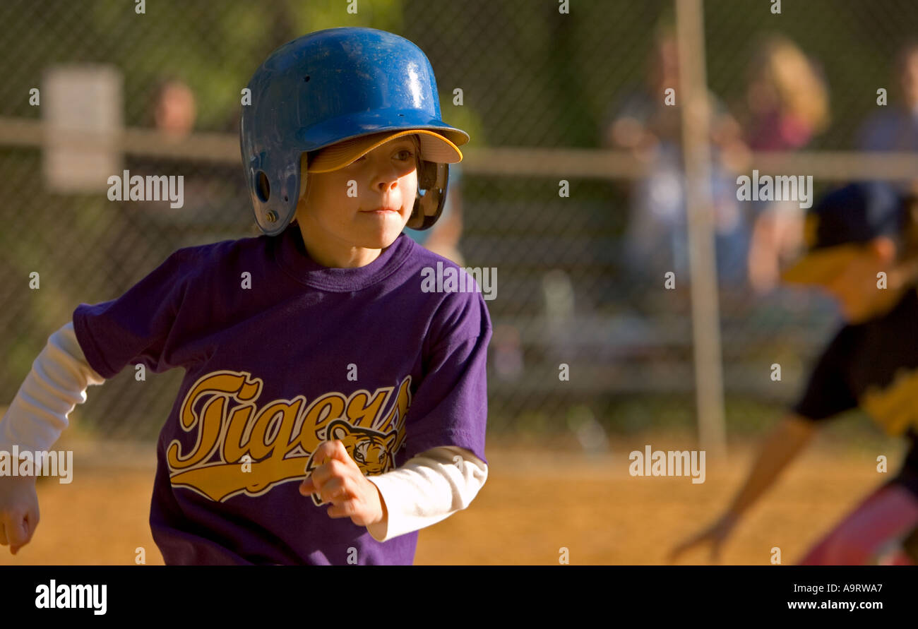 Softball player running to a base Stock Photo Alamy
