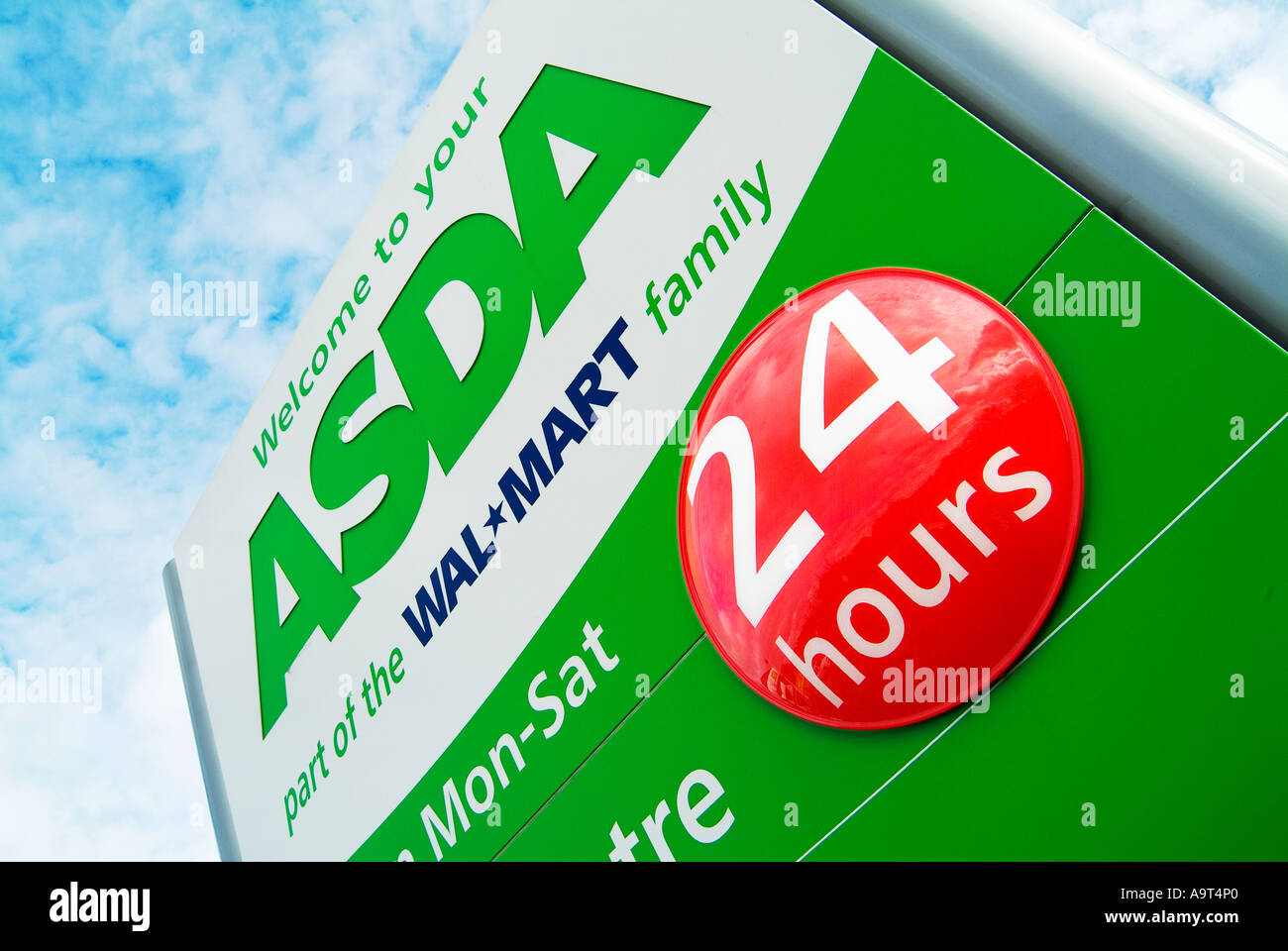 24 hour opening sign outside ASDA superstore Stock Photo Alamy