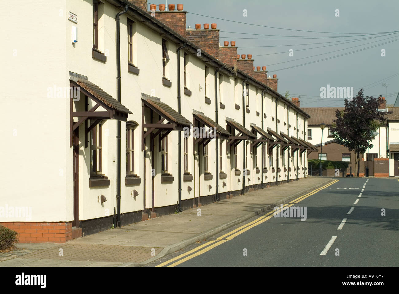 Row of terraced houses in the Vulcan Village near St Helens, Merseyside, UK Stock Photo
