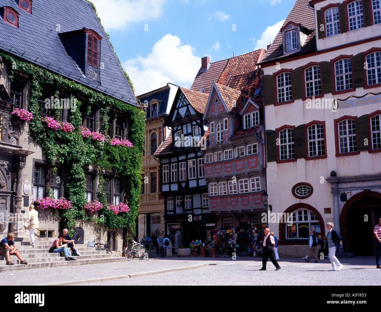 Town hall rathaus and half timbered buildings in the market place Quedlinburg Sachsen Anhalt Germany Stock Photo