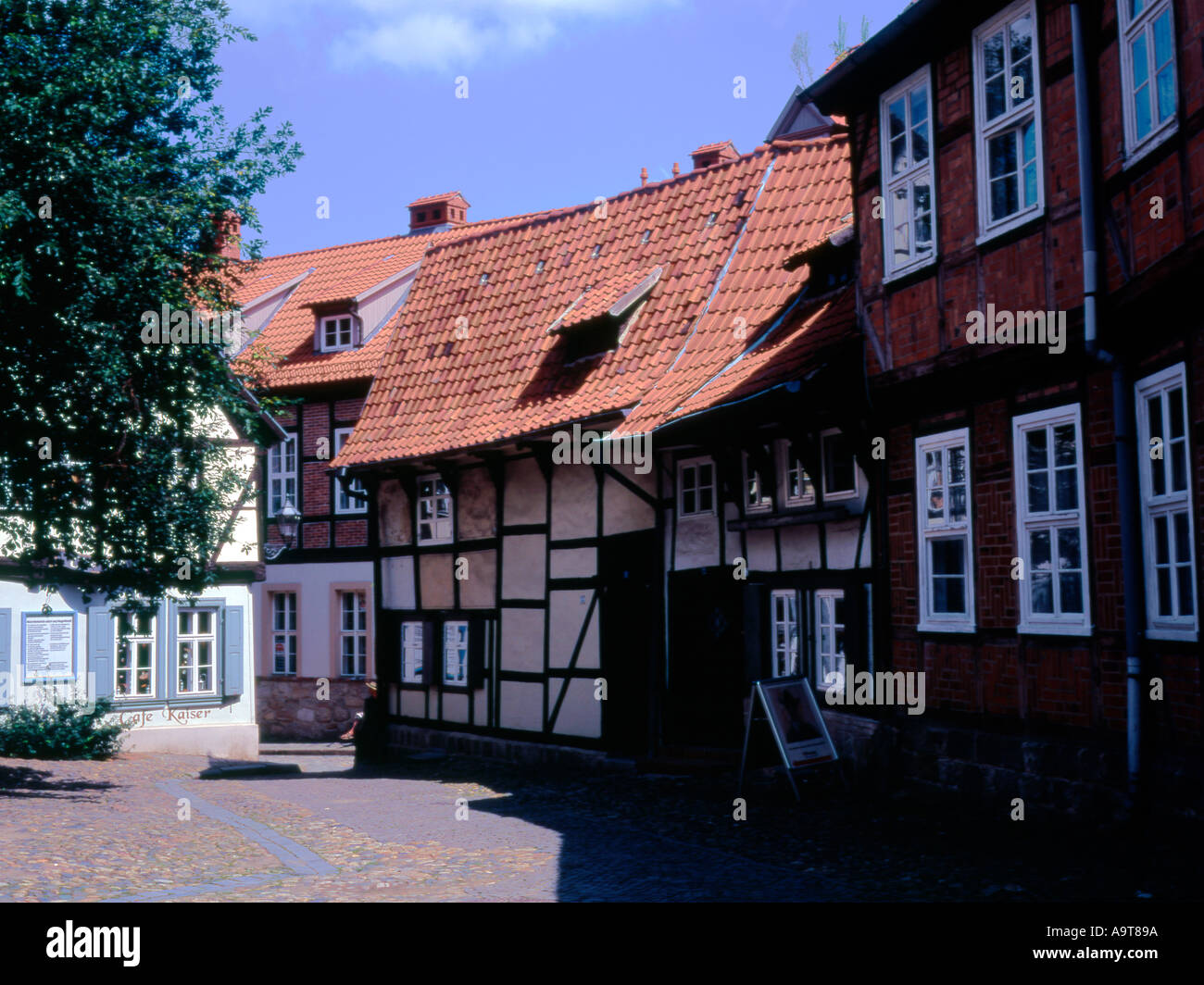 Medieval square with decorated half timberd houses in Quedlinburg Sachsen Anhalt Germany Stock Photo