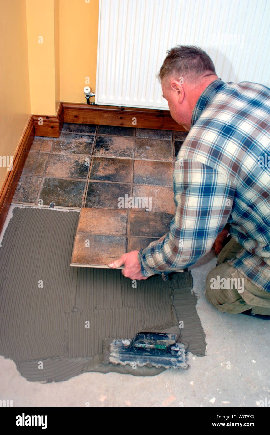 Fitting Floor Tiles Stock Photo - Alamy