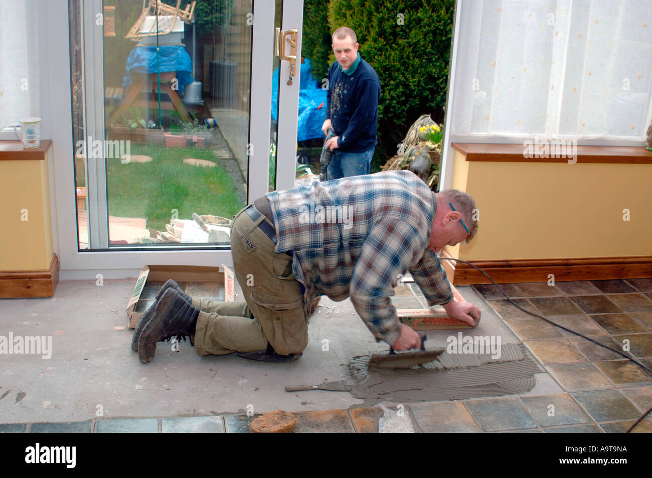 Fitting Floor Tiles Stock Photo Alamy