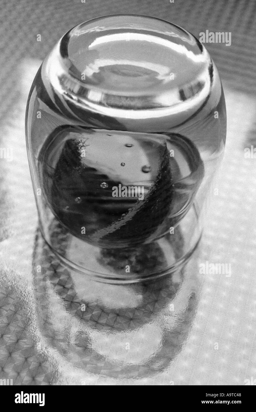 Glass and paperweight still life Stock Photo Alamy