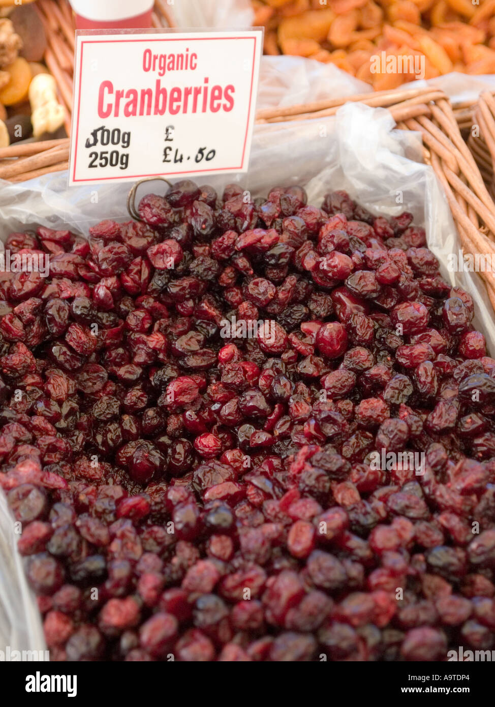 Organic cranberries for sale on a farmers Market in the UK Stock Photo