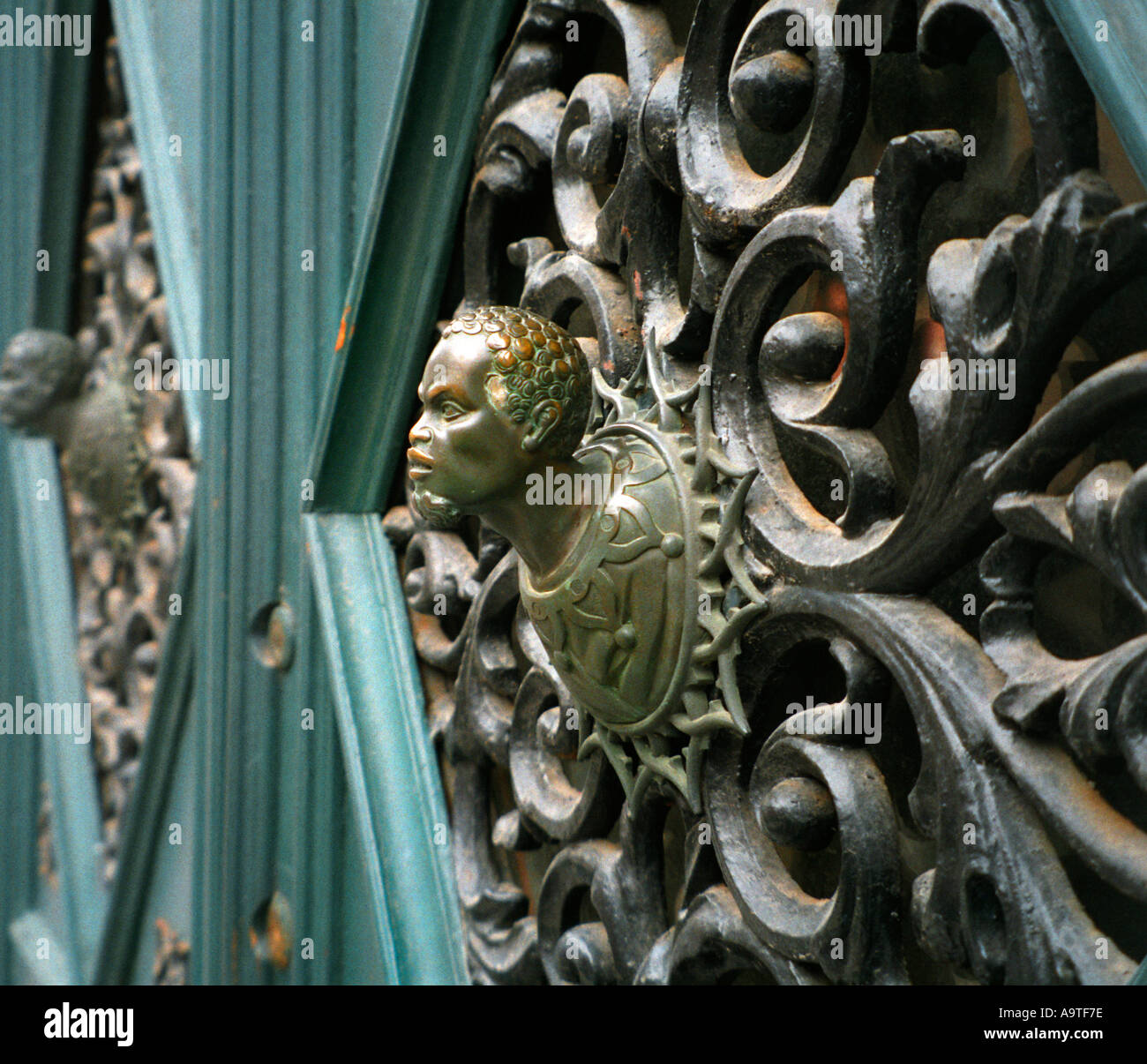Ornate Gateway with Bronze Gargoyl Venice Italy Stock Photo