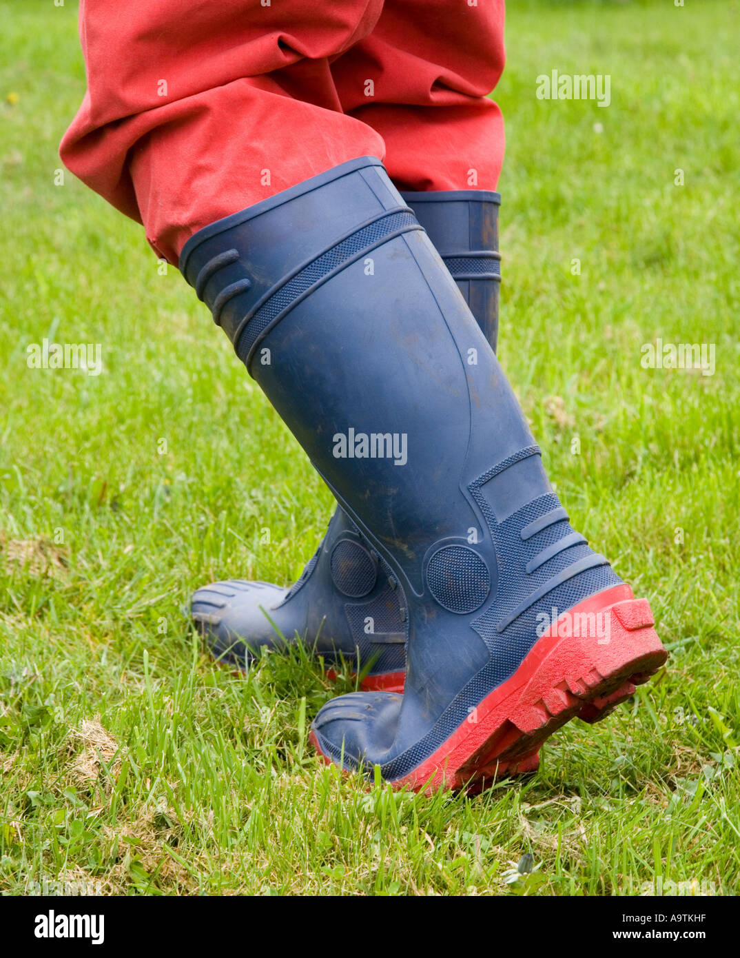 Red wellington boots mud hi-res stock photography and images - Alamy