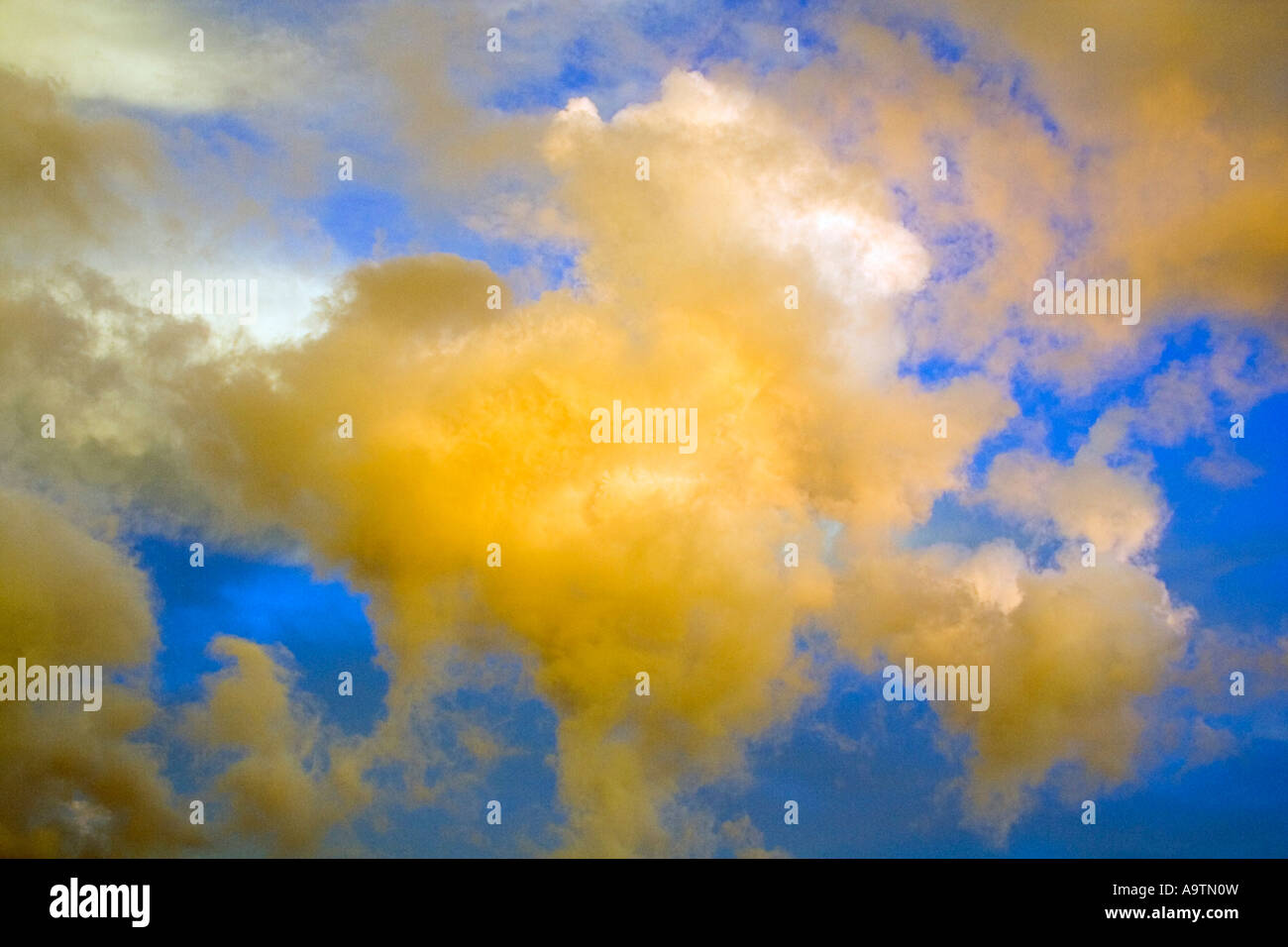 Surreal Clouds Sunset Stock Photo - Alamy