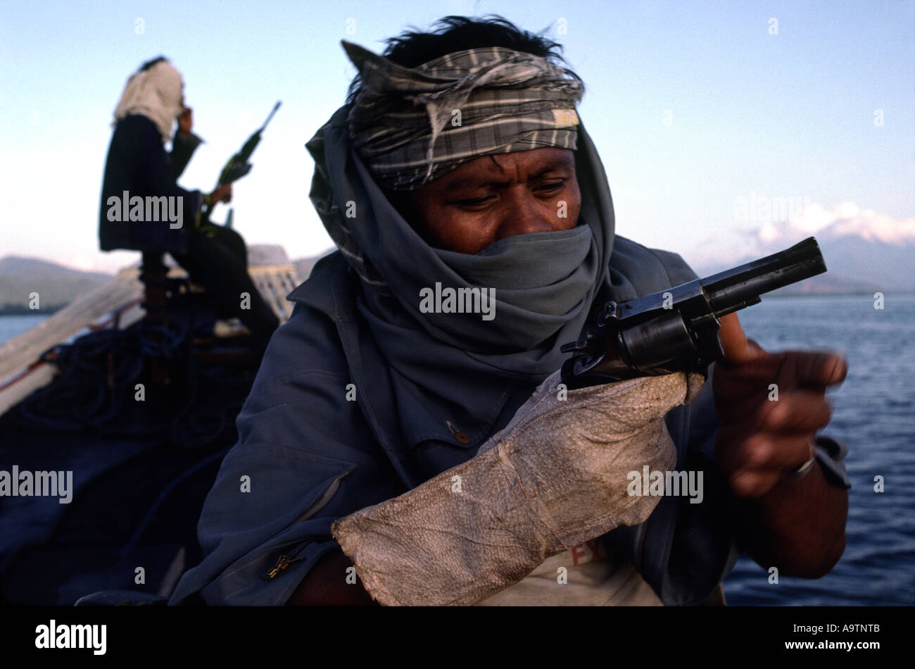 The Philippines  Pirate 'Big Boy'  inspects his locally made hundgun Stock Photo