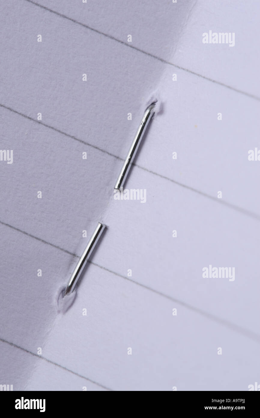 Staple notepad book binding Stock Photo Alamy