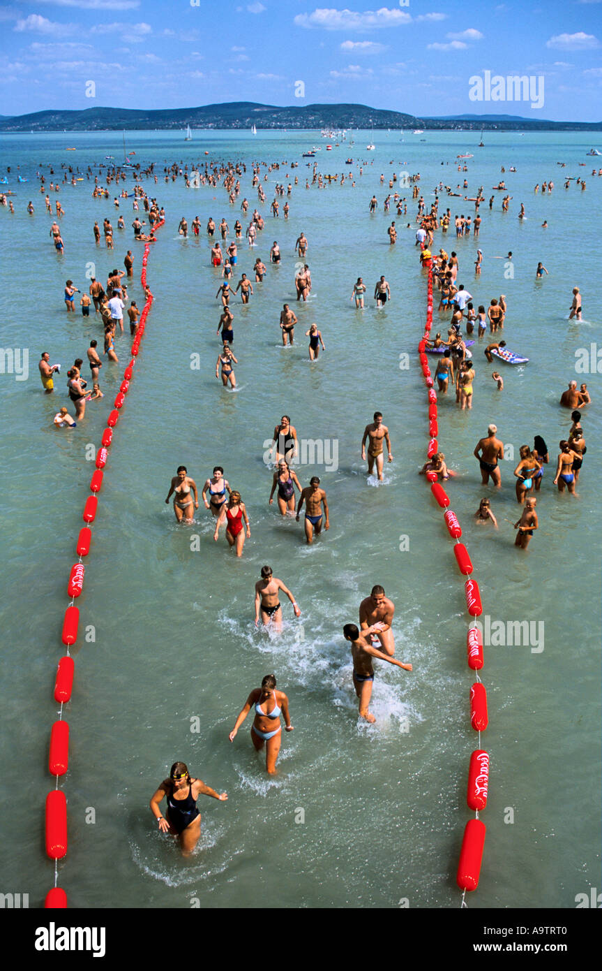 Lake Balaton Hungary Swimmers arriving in the town of Balatonbulgar after  completing the 5.2 km annual swim across the lake Stock Photo - Alamy