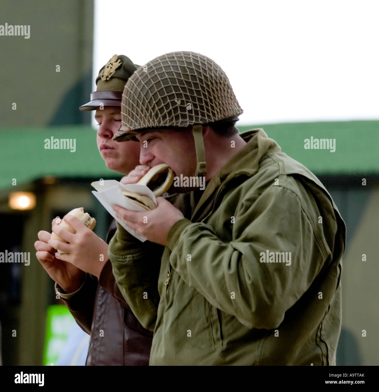 american ww2 army soldier eating burger at glen miller festival Stock Photo