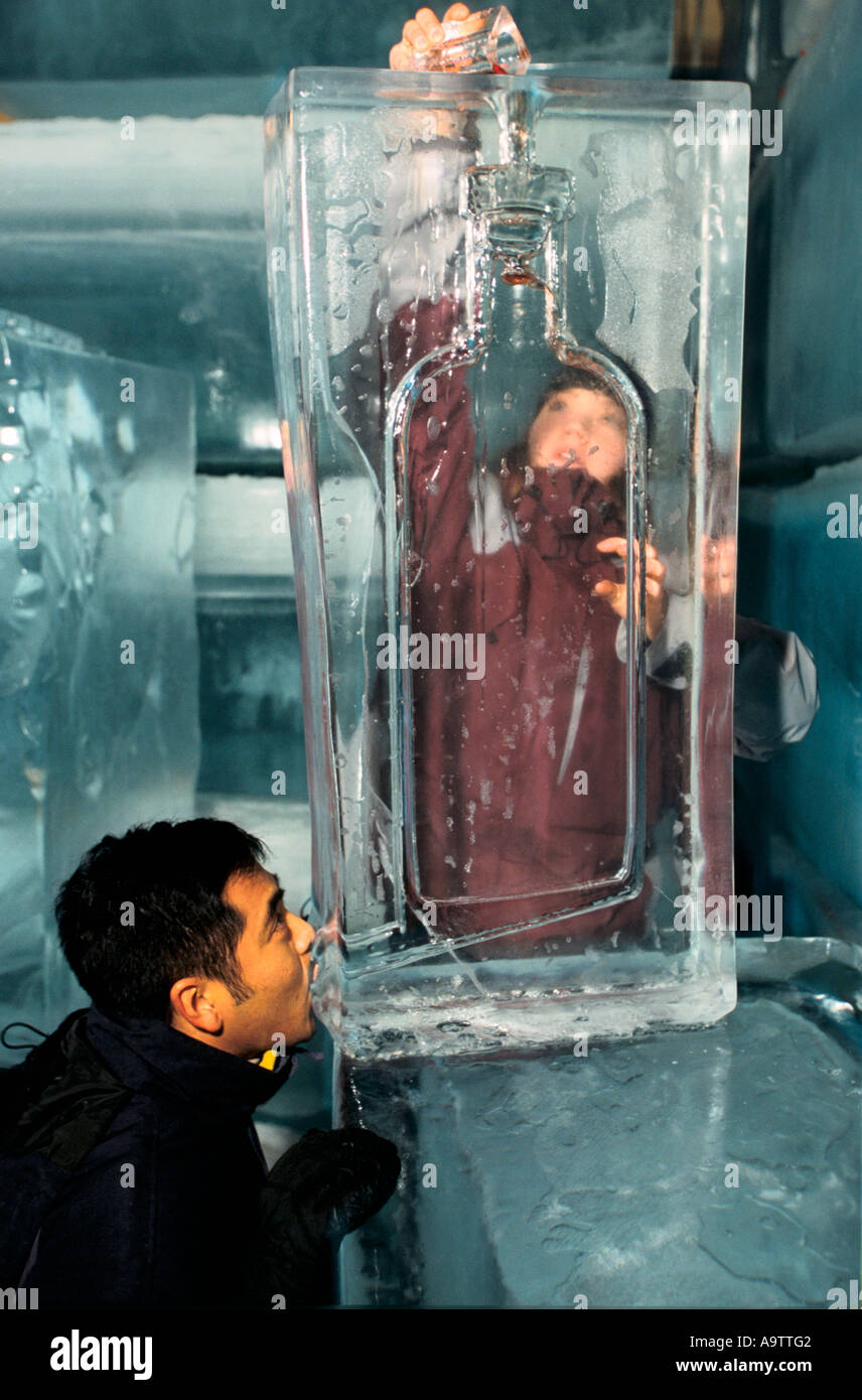 https://c8.alamy.com/comp/A9TTG2/drinking-a-vodka-cocktail-cooled-by-passing-vodka-through-an-ice-luge-A9TTG2.jpg