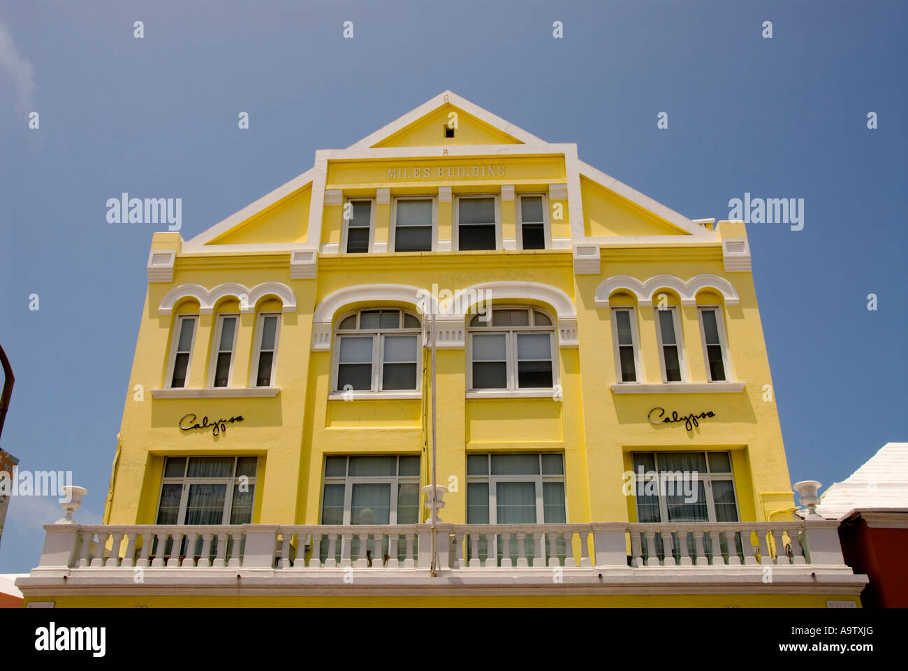 Bermuda Hamilton Front Street shops shopping yellow building Stock