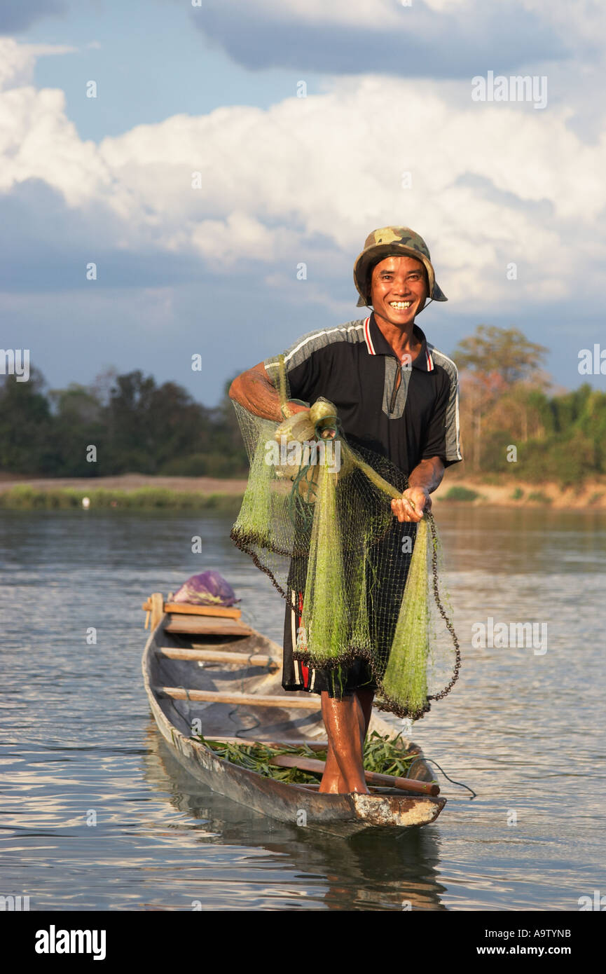 Fisherman Holding Fishing Net Stock Photo - Alamy