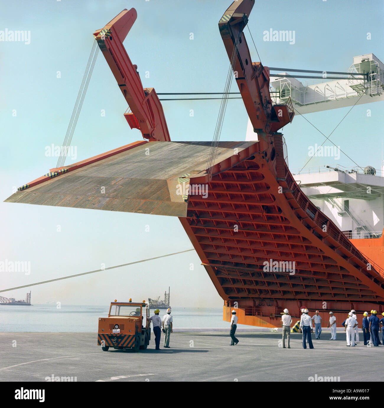 Container ship lowers its ramp for unloading Stock Photo - Alamy