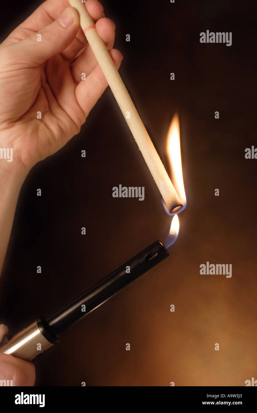 ear candle therapy Stock Photo Alamy