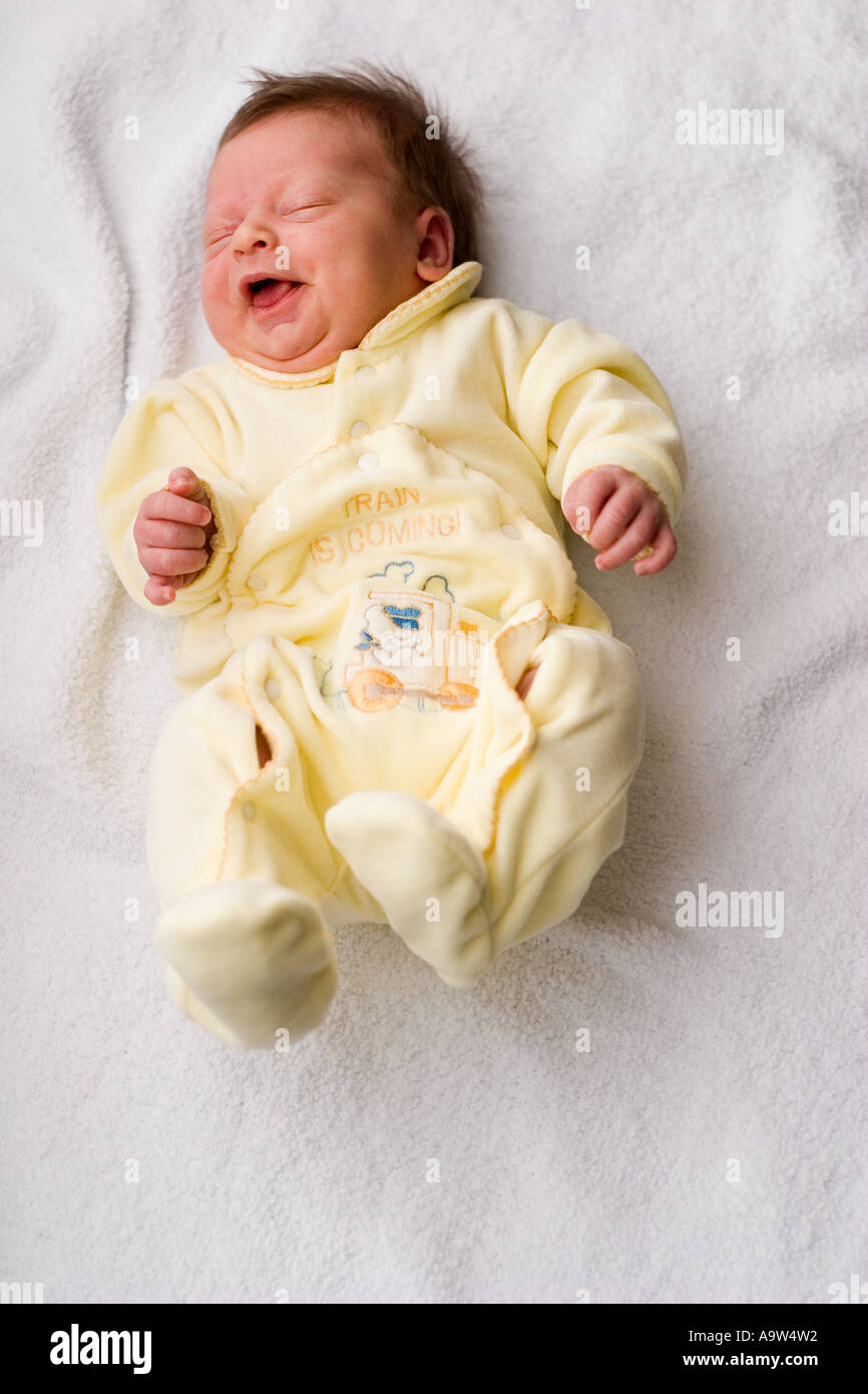 Baby Stretching on Blanket Stock Photo Alamy