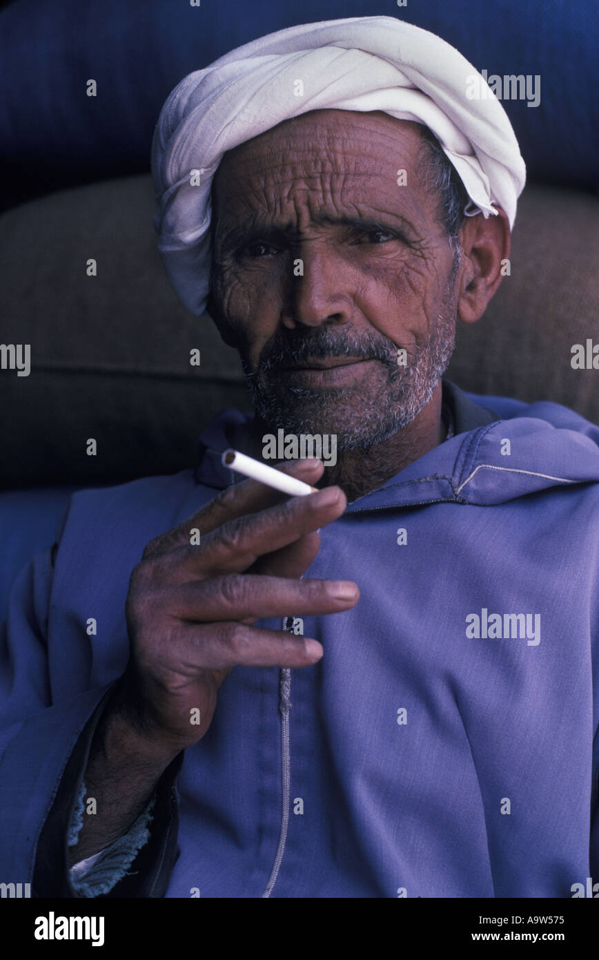 cigarette in morocco Man holding cigarette Fez morocco Stock Photo