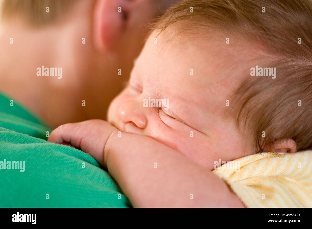 Mother Holding Baby Girl Stock Photo Alamy