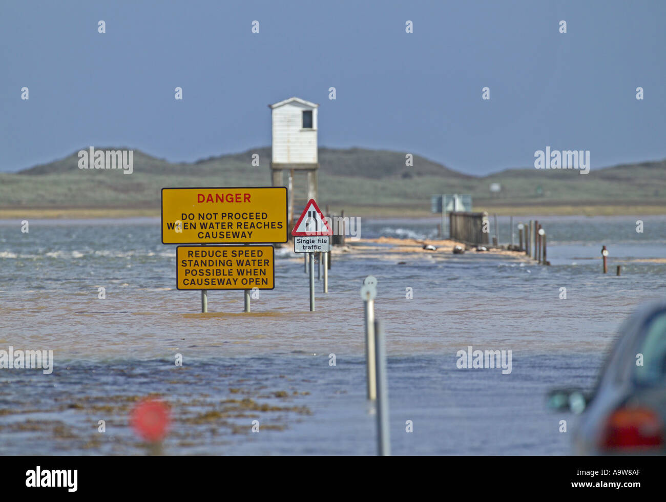 Causeway to Holy Island covered at high tide Lindisfarne Northumberland UK summer Stock Photo