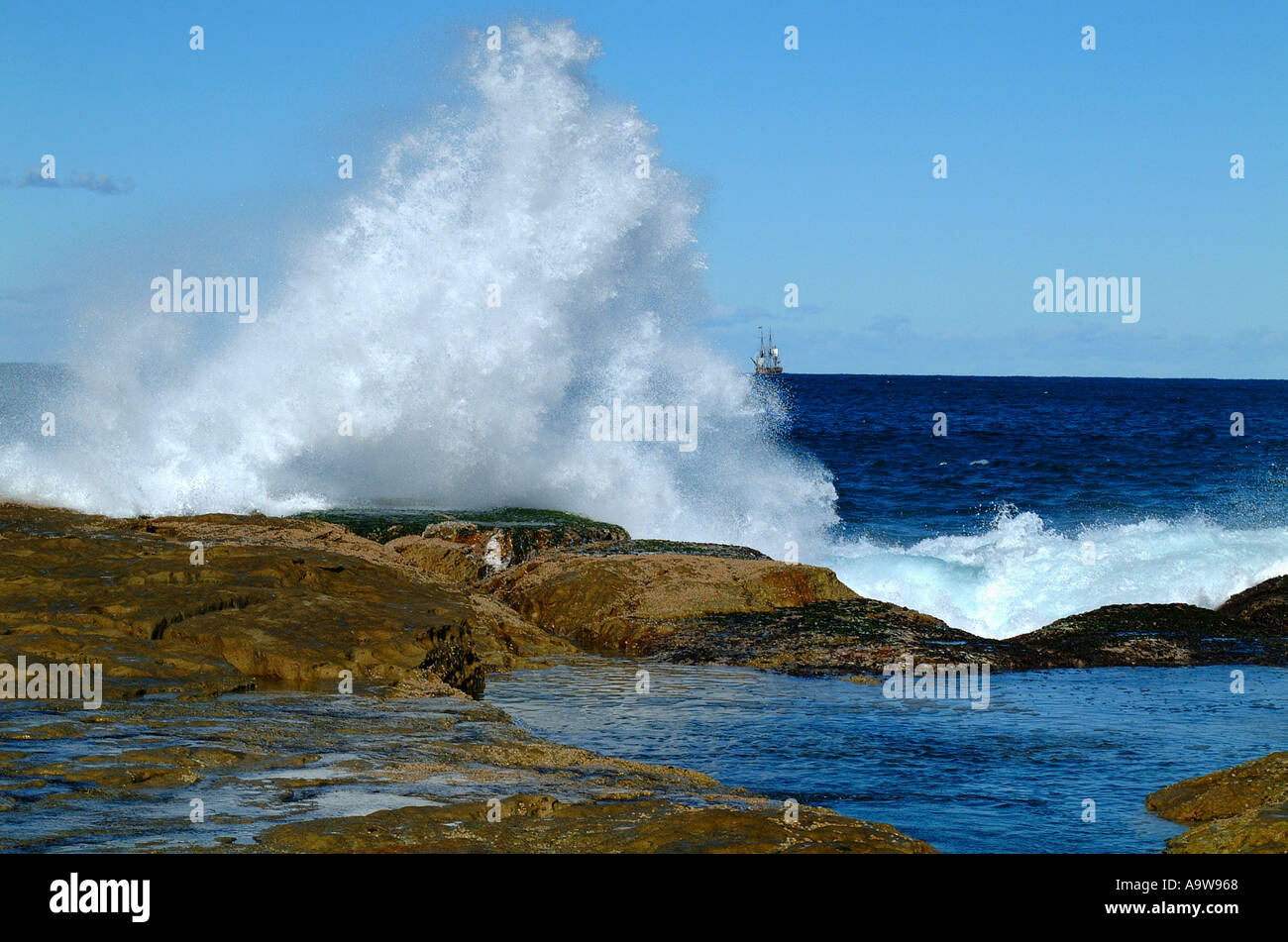 Sea water, wave and Tall ship on Bondi beach Stock Photo