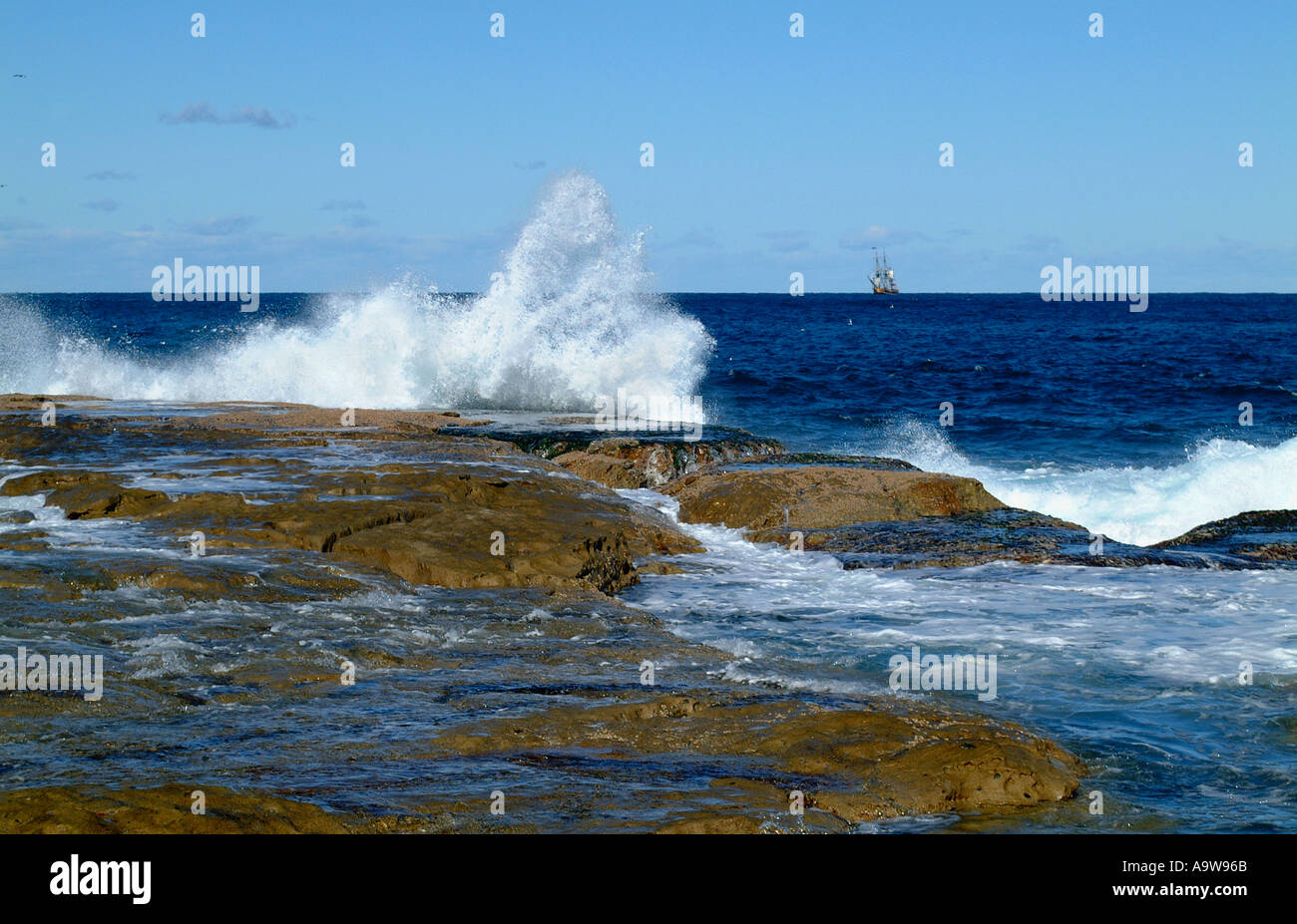 Sea water, wave and Tall ship on Bondi beach Stock Photo