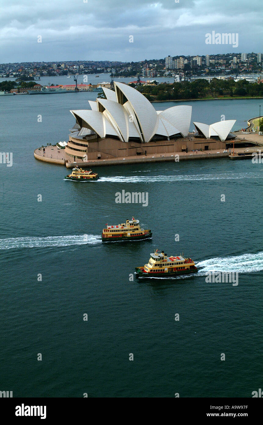 Sydney opera house with three ferries Stock Photo